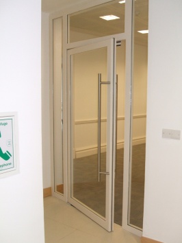 Powder coated fire rated single door with side and transom panels